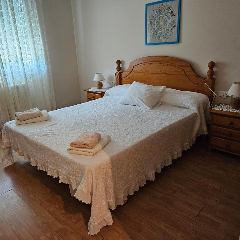 Posteľ alebo postele v izbe v ubytovaní Lhamo Mandala House