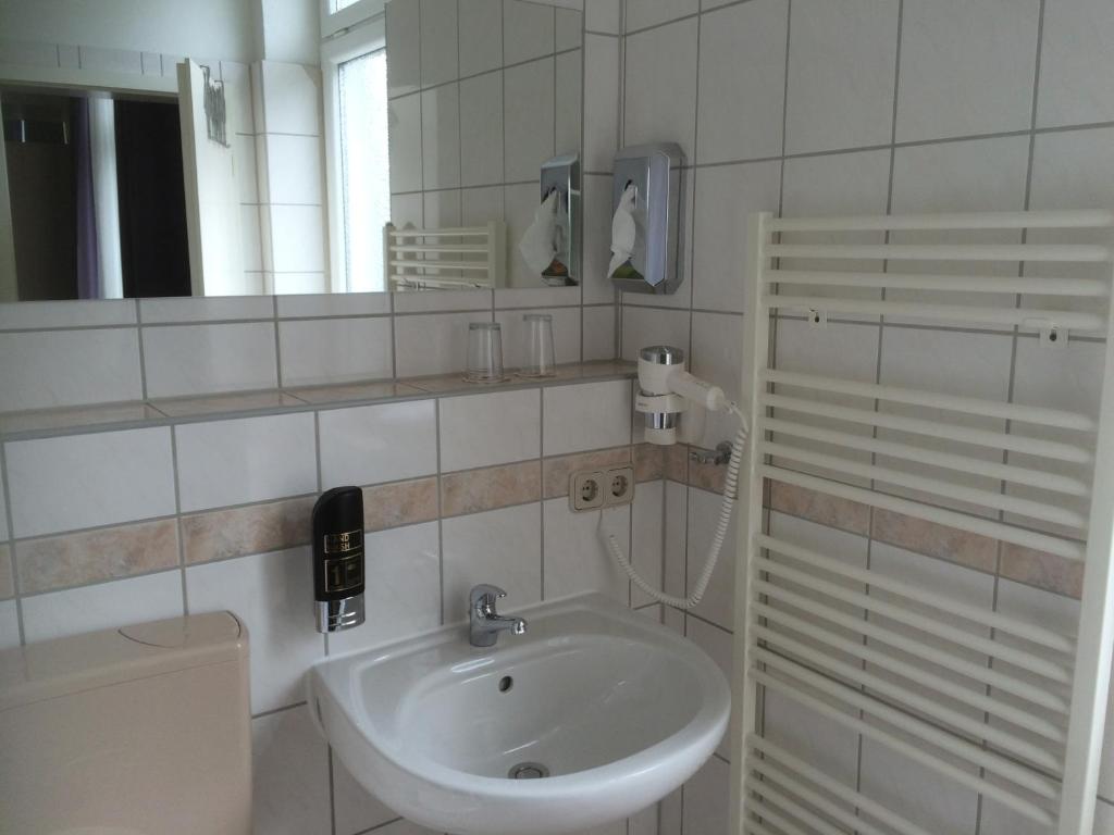 Koupelna v ubytování Hotel Zwei Mohren