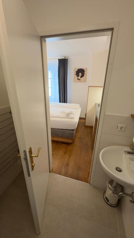 Postel nebo postele na pokoji v ubytování Guesthouse Mozart - Apartment House