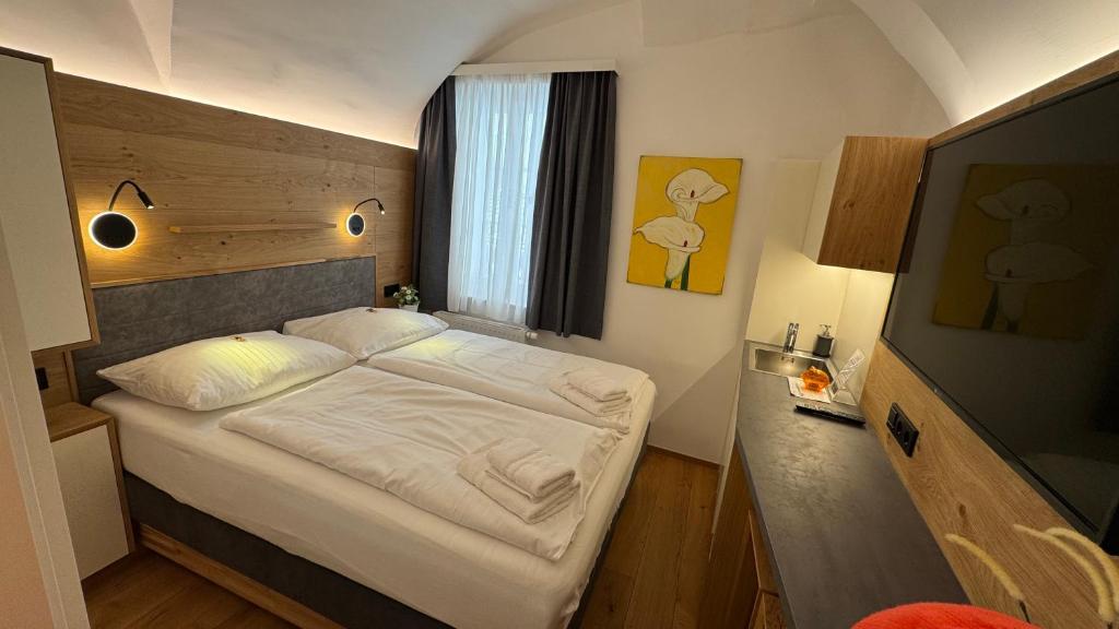 Postel nebo postele na pokoji v ubytování Guesthouse Mozart - Apartment House
