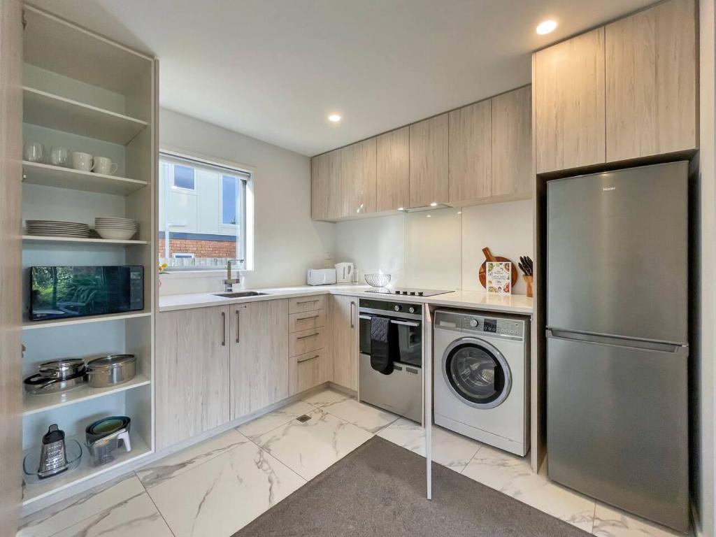 Køkken eller tekøkken på Perfectly Cosy Riccarton 2BR Abode