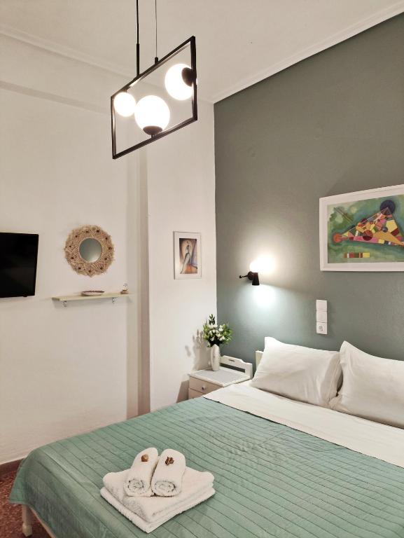 Postel nebo postele na pokoji v ubytování Apartments Papadioti