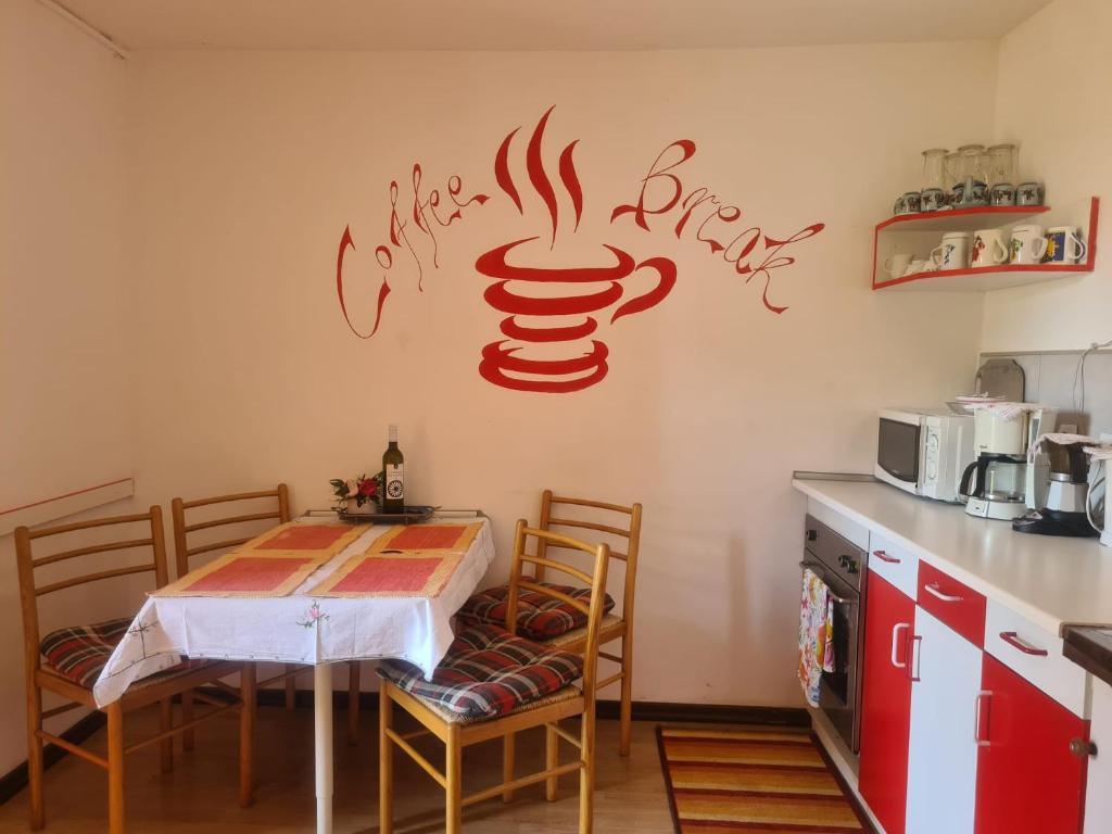 Kuchnia lub aneks kuchenny w obiekcie Villa Rose Apartment