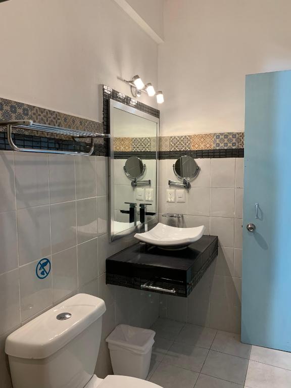 Koupelna v ubytování Aparthotel Siete 32