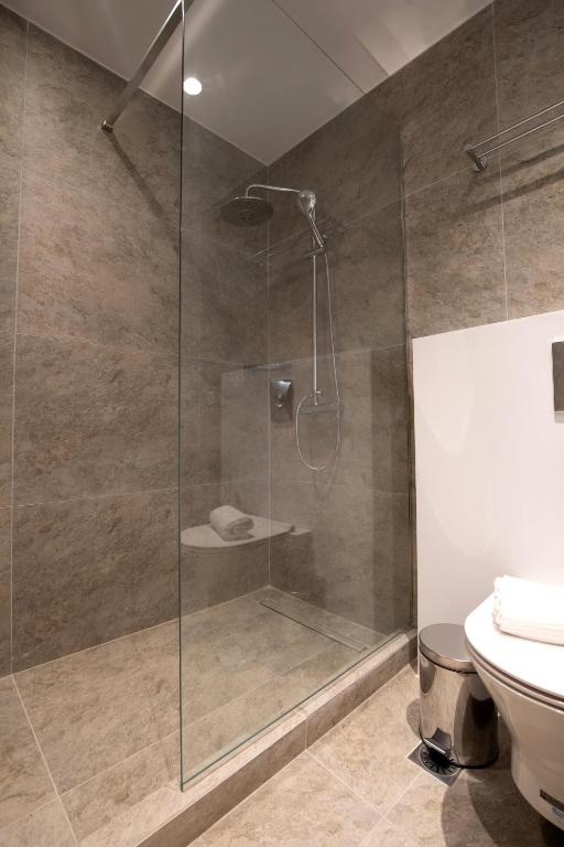 Koupelna v ubytování Trinasus Hotel