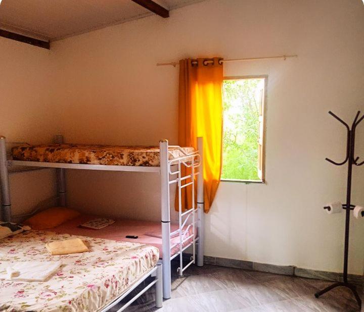 Postel nebo postele na pokoji v ubytování Pousada Pé na Trilha