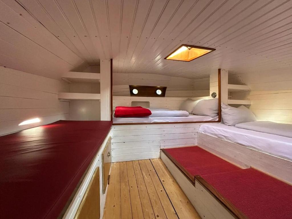 Postel nebo postele na pokoji v ubytování Hausboot Jonathan