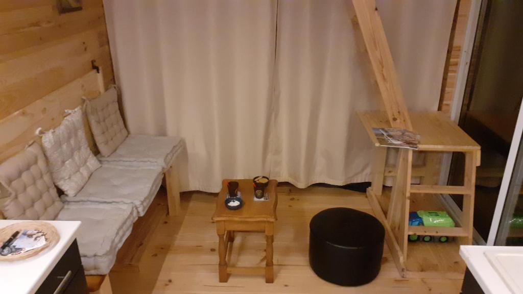 Area soggiorno di Tiny House du Pigeonnier