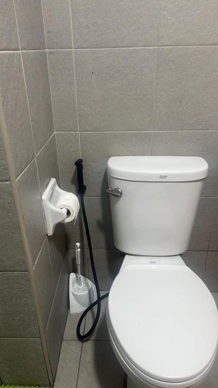 Koupelna v ubytování Messatiera Condo - UrbanSol Stay