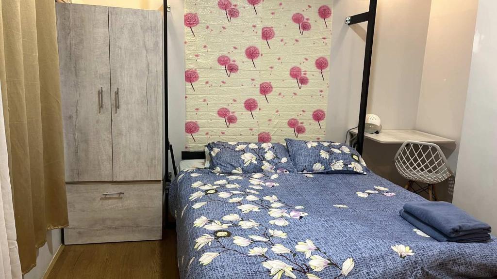 Postel nebo postele na pokoji v ubytování Messatiera Condo - UrbanSol Stay