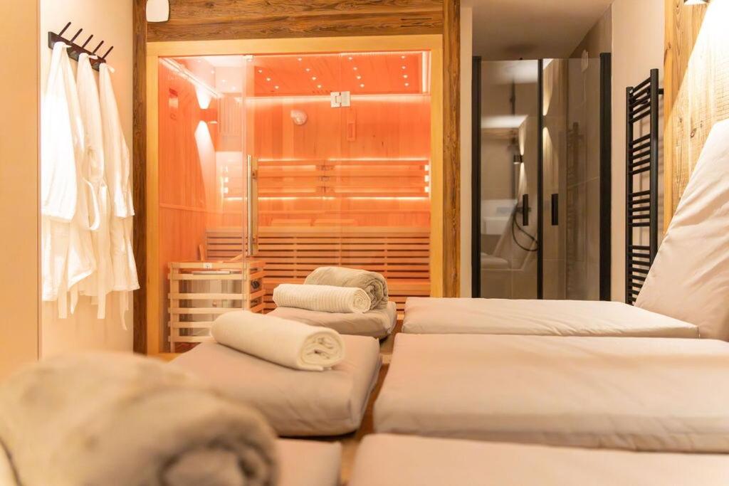 Ένα ή περισσότερα κρεβάτια σε δωμάτιο στο L'Auberge - Appartement 3 chambres avec sauna