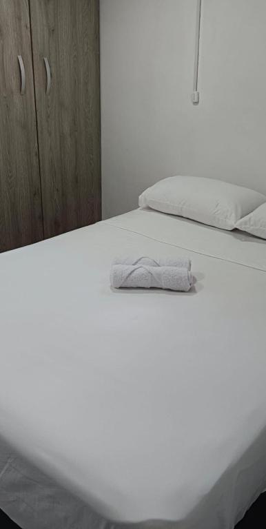 Katil atau katil-katil dalam bilik di Apartamento en itagui