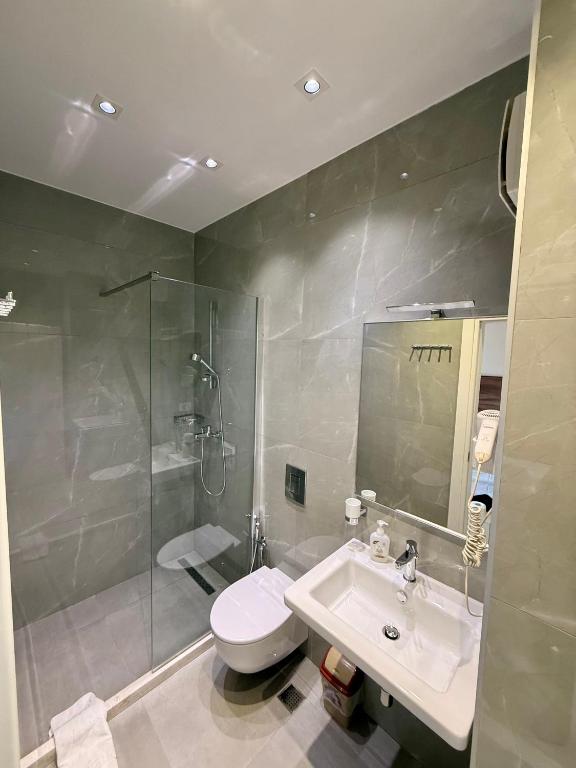 Vannituba majutusasutuses Rooms Dionis
