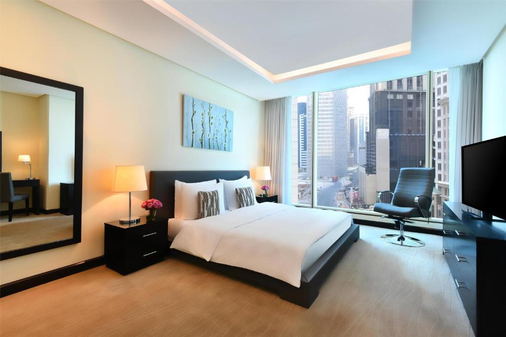 TV a/nebo společenská místnost v ubytování Kempinski Residences & Suites, Doha