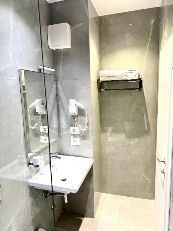 Vannituba majutusasutuses Rooms Dionis