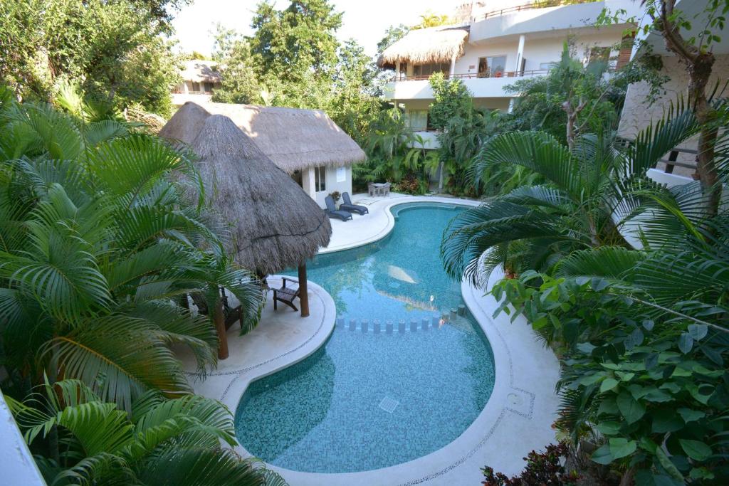 Photo inspiration: Gated Penthouse Community With Rooftop Common Space Reference: Peaceful Penthouse With Private Rooftop In Gated Community Tulum