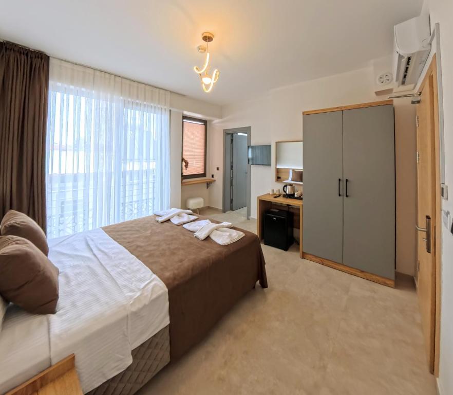 Postel nebo postele na pokoji v ubytování Naturalis Pamukkale Otel