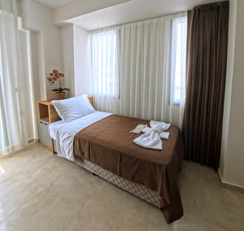 Postel nebo postele na pokoji v ubytování Naturalis Pamukkale Otel