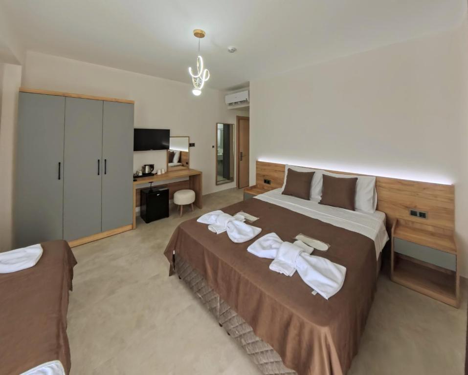 Postel nebo postele na pokoji v ubytování Naturalis Pamukkale Otel