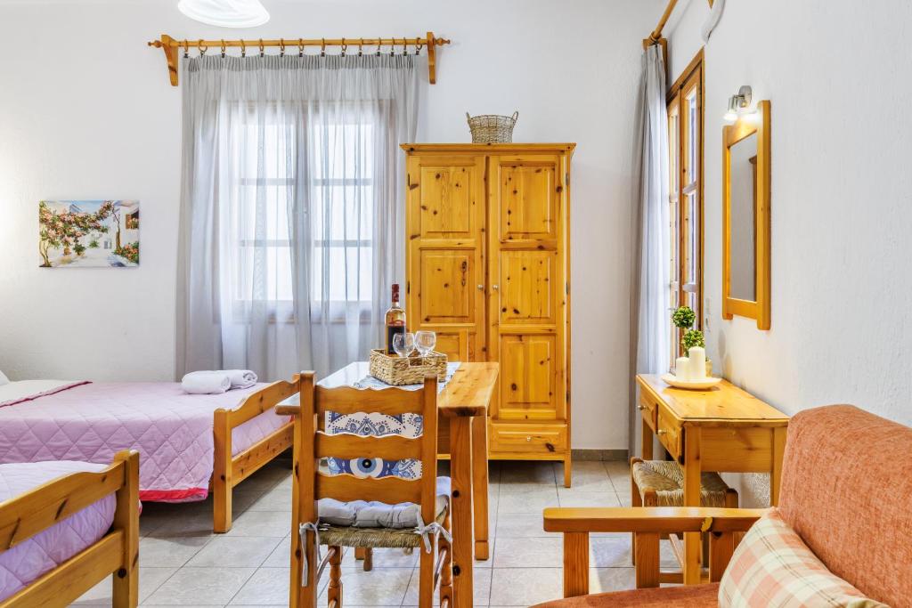 Postel nebo postele na pokoji v ubytování Nikolaos studios apartments