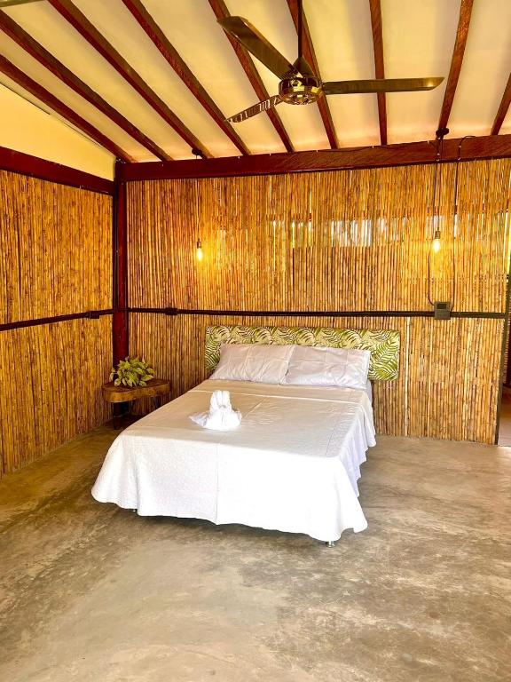 Postel nebo postele na pokoji v ubytování Finca Hotel Doradal