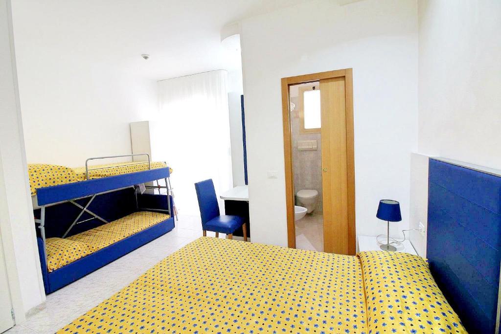 Postel nebo postele na pokoji v ubytování Hotel Eraclea