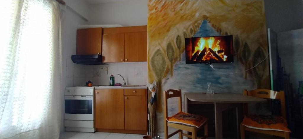 Kuchyňa alebo kuchynka v ubytovaní Studio old town Rethymno