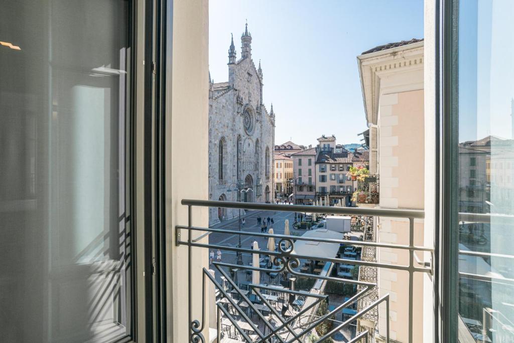 Balkón nebo terasa v ubytování Palazzo La Cortesella - Modern Design & Central Location