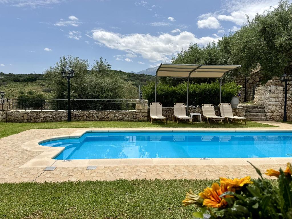 Bazén v ubytování Villa Vangelis Stylos Crete nebo v jeho okolí