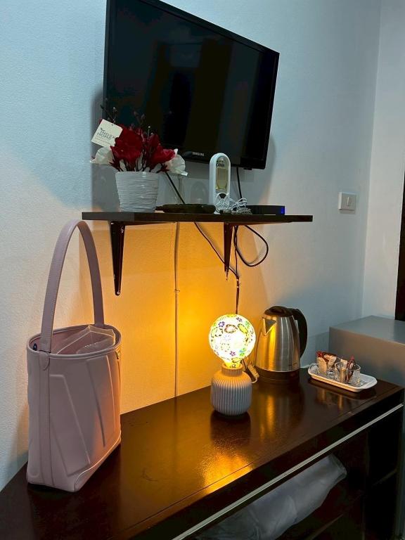 TV a/nebo společenská místnost v ubytování DANK Hotel 420 friendly