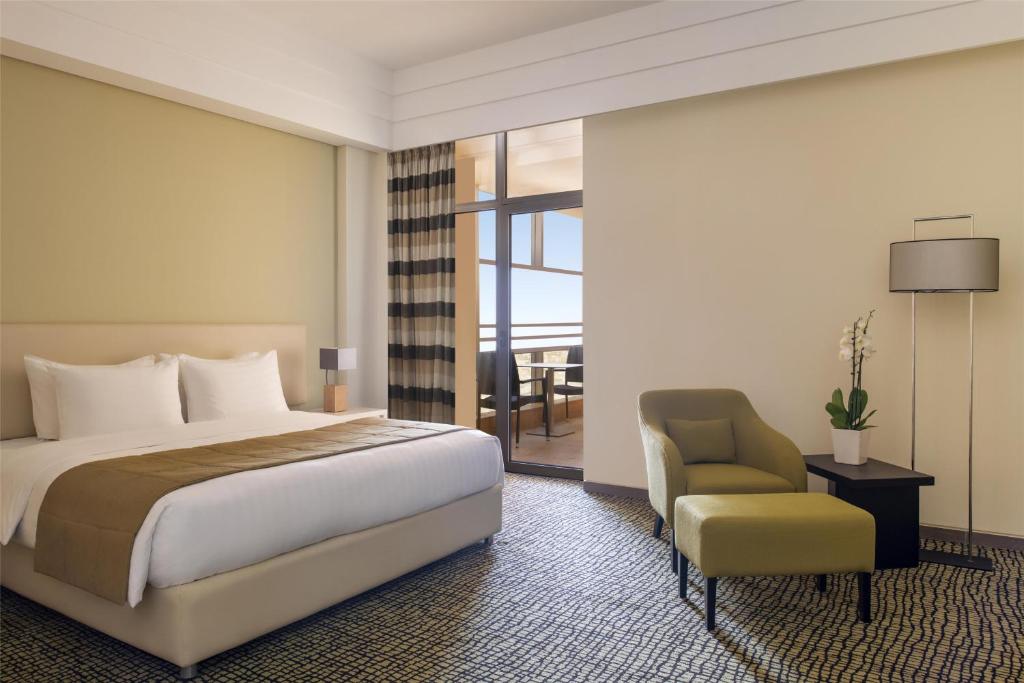 Postel nebo postele na pokoji v ubytování Bristoria Hotel Erbil