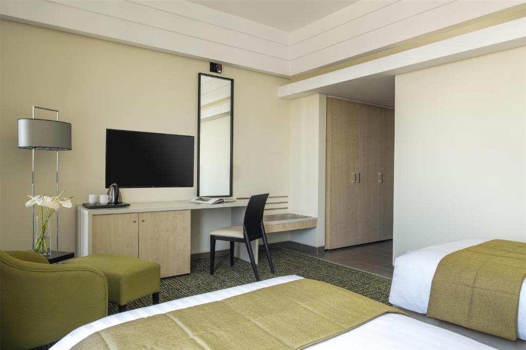 TV a/nebo společenská místnost v ubytování Bristoria Hotel Erbil