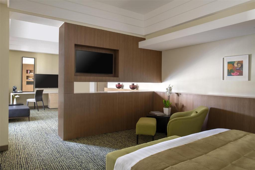 TV a/nebo společenská místnost v ubytování Bristoria Hotel Erbil