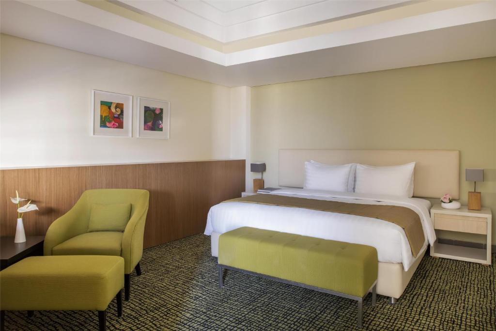 Postel nebo postele na pokoji v ubytování Bristoria Hotel Erbil