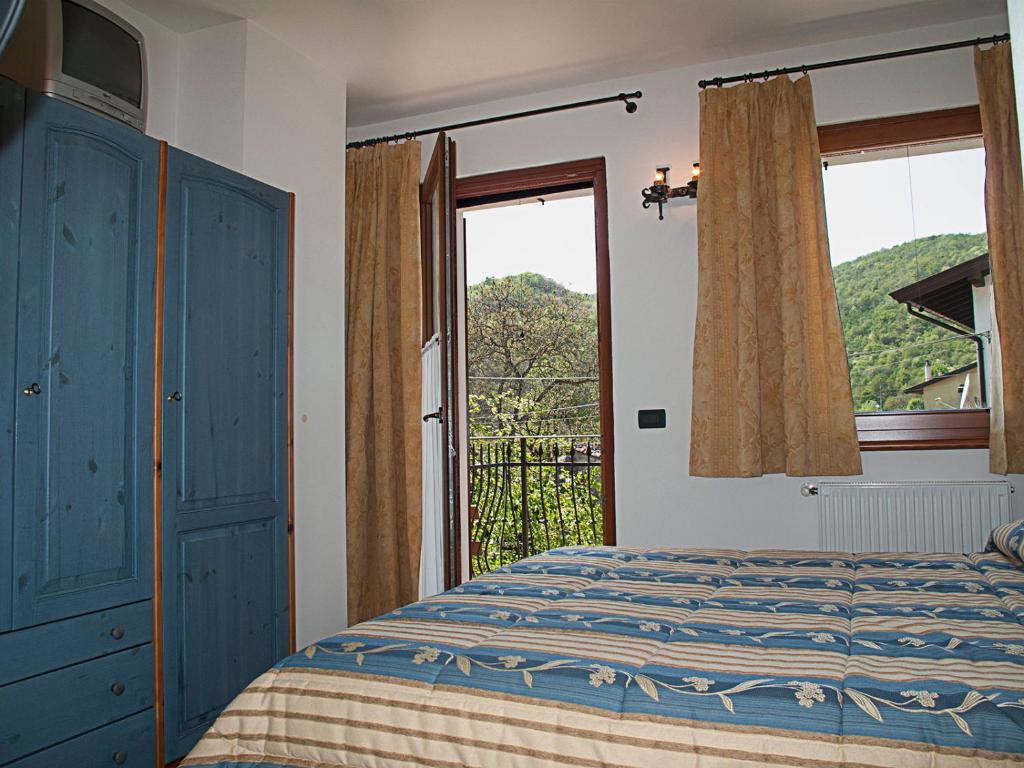 Postel nebo postele na pokoji v ubytování Casa Luis