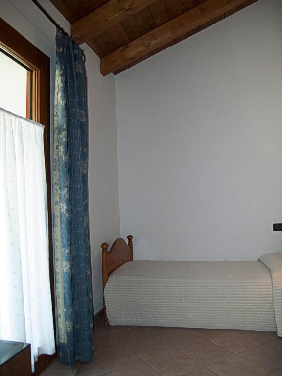 Postel nebo postele na pokoji v ubytování Casa Luis