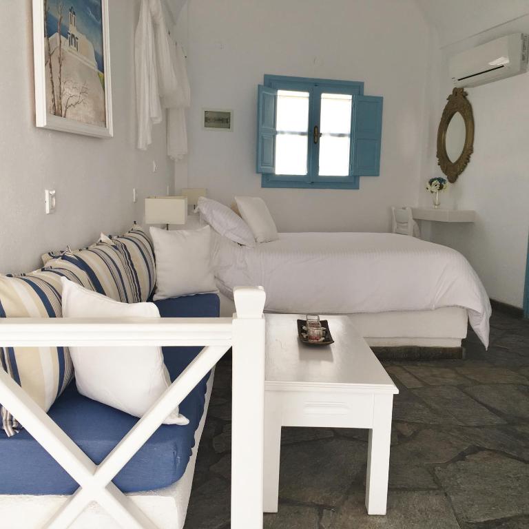 Postel nebo postele na pokoji v ubytování Langas Villas