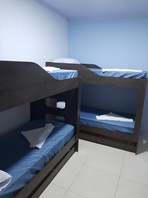 Postel nebo postele na pokoji v ubytování Casa de Temporada Ceu e Mar