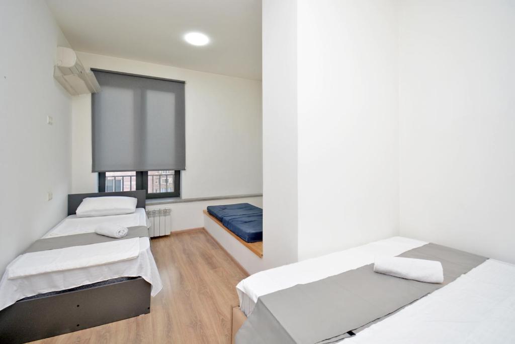 Postel nebo postele na pokoji v ubytování Wanderlust Guest House Inn Northern Avenue