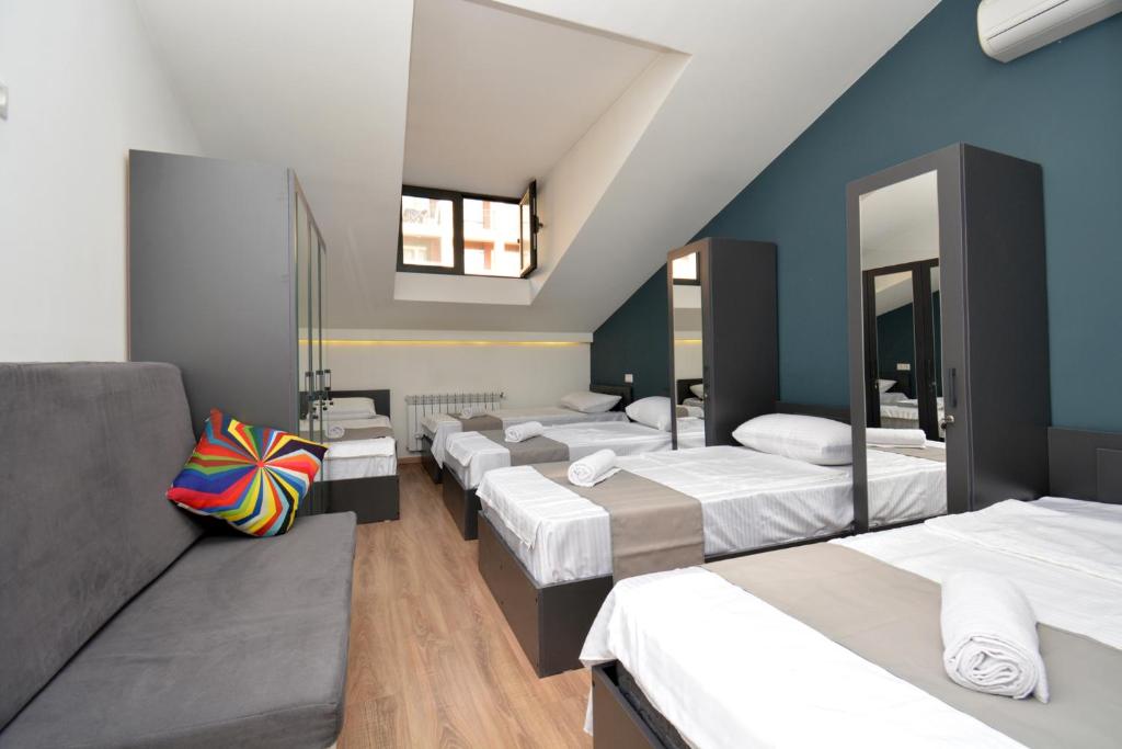 Postel nebo postele na pokoji v ubytování Wanderlust Guest House Inn Northern Avenue