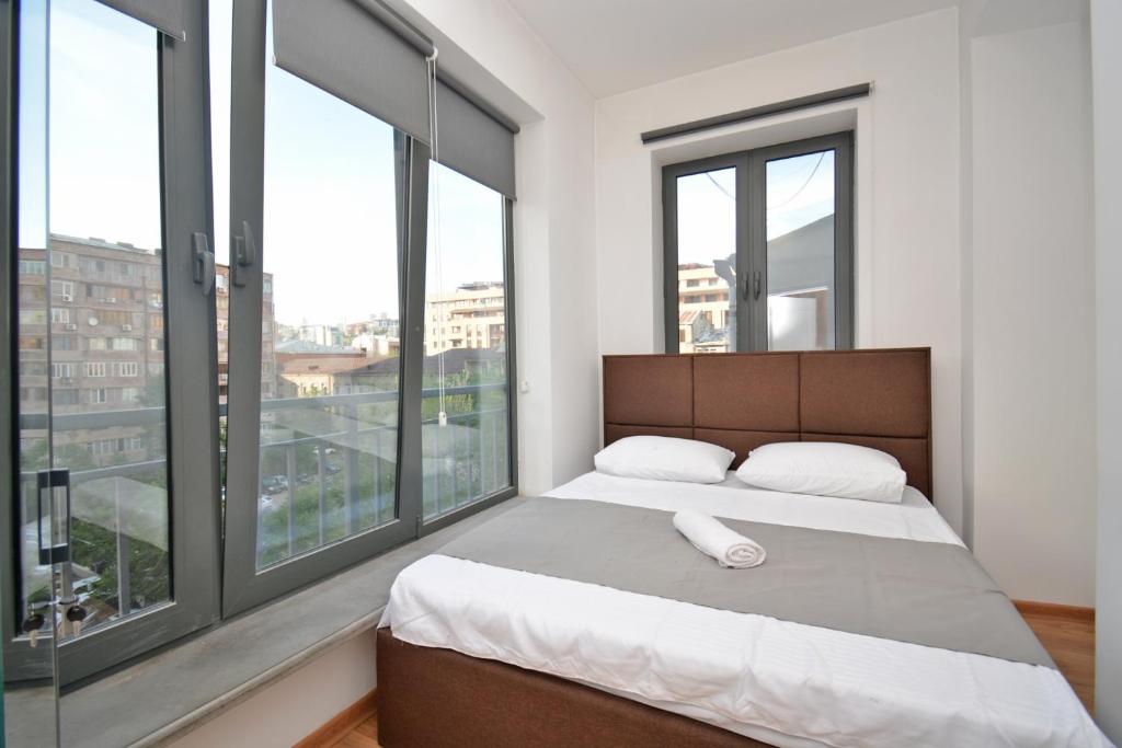 Postel nebo postele na pokoji v ubytování Wanderlust Guest House Inn Northern Avenue