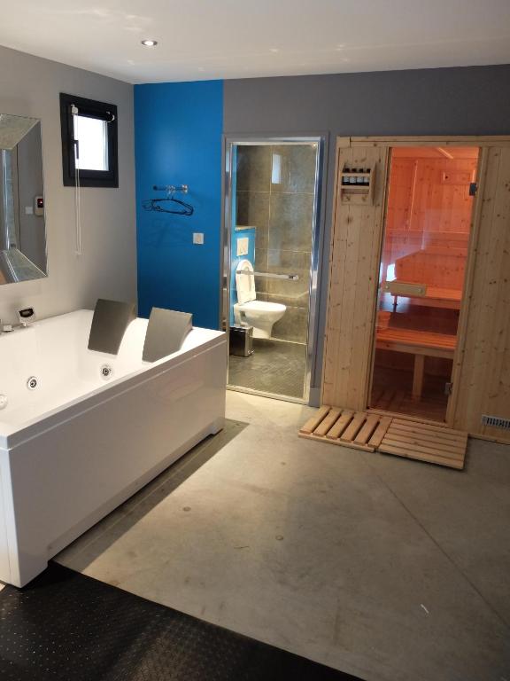 TV a/nebo společenská místnost v ubytování Be Loft B&B Pool & Spa