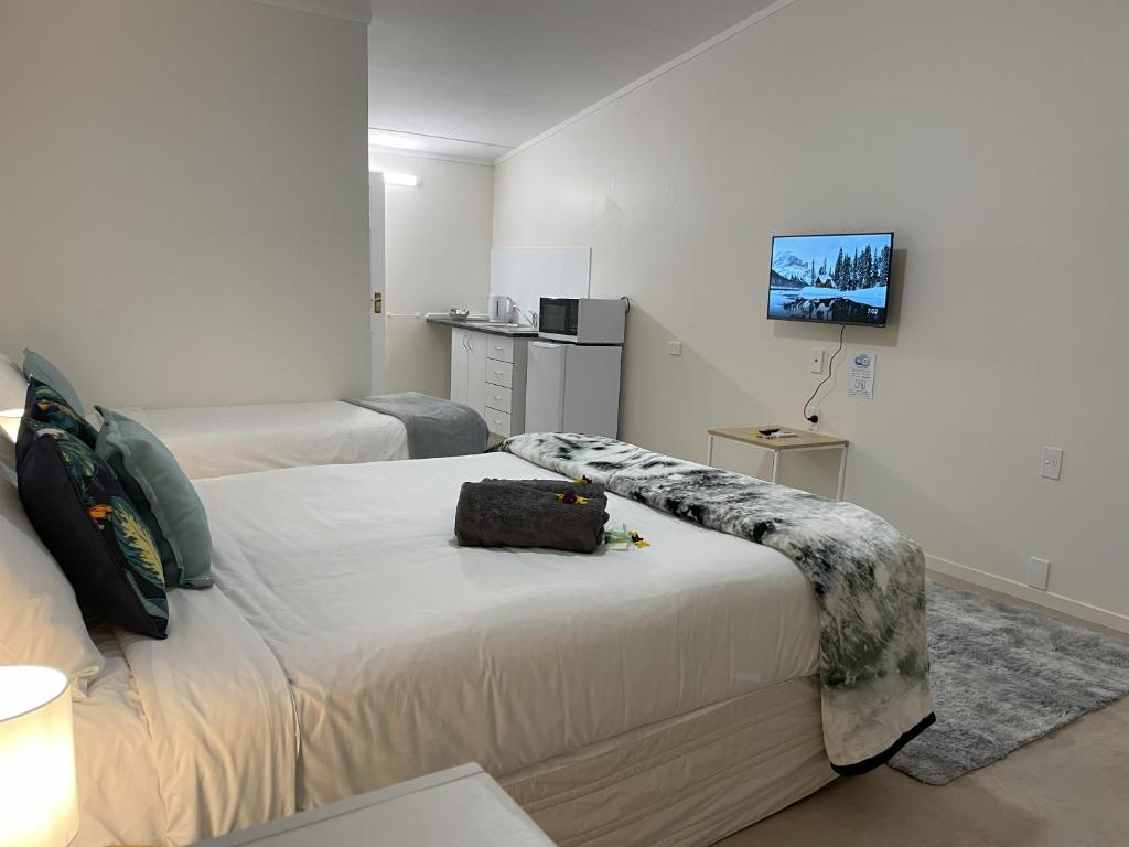 Postel nebo postele na pokoji v ubytování Tirau Motor Inn