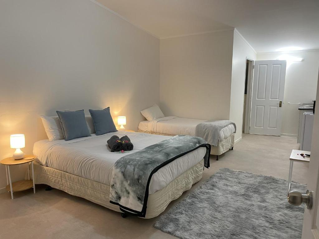 Postel nebo postele na pokoji v ubytování Tirau Motor Inn