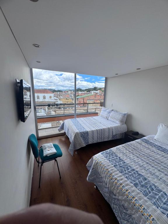 Postel nebo postele na pokoji v ubytování Hotel link