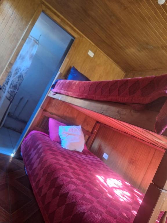 Una cama o camas en una habitación de Hostel INK - Duerme Como En Casa