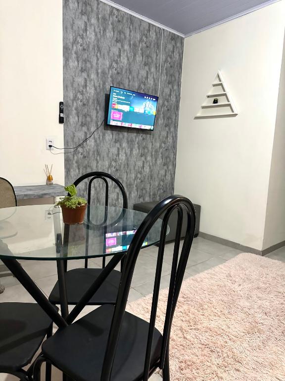 Uma televisão e/ou sistema de entretenimento em Residencial Davisis - Parada do Jalapão