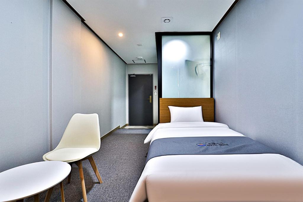 Postel nebo postele na pokoji v ubytování Hotel Noah
