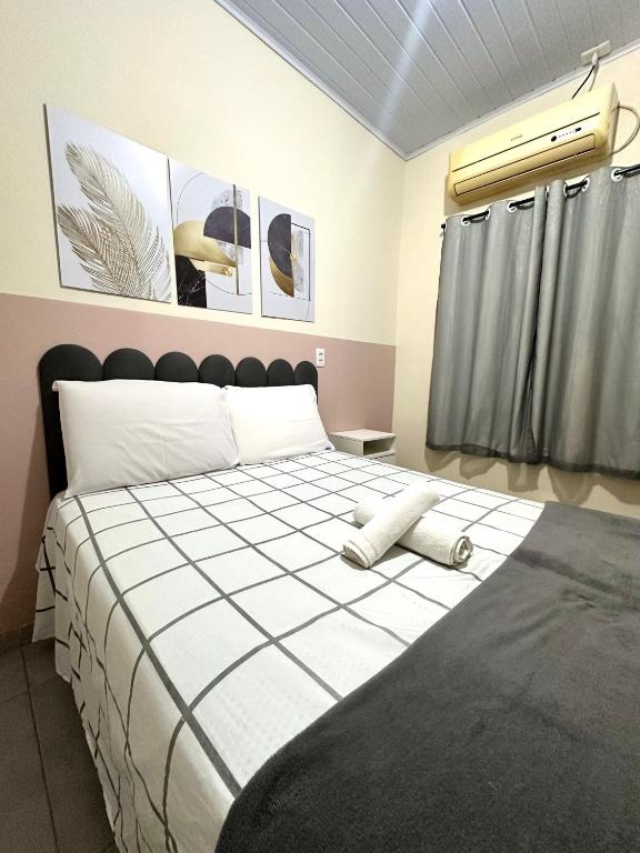Uma cama ou camas num quarto em Residencial Davisis - Parada do Jalapão