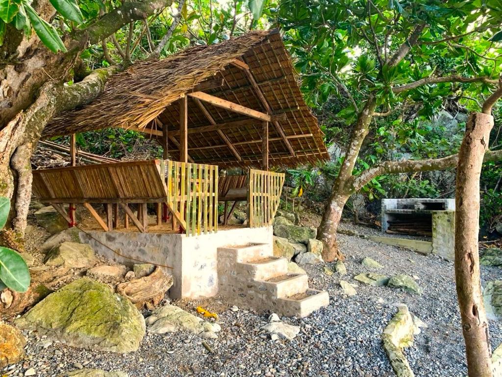 Zahrada ubytování L'Astrolabe - Private Beach